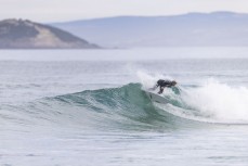 Keo Morrison makes the most of a small winter swell at Blackhead, Dunedin, New Zealand.Photo: Derek Morrison