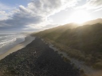 Keo Morrison on the rocks at Blackhead, Dunedin, New Zealand.