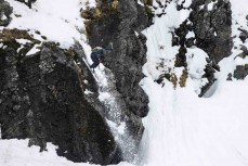 Theo Blyth drops a cliff during the NZ Junior Freeride Tour event held at The Remarkables ski field, Queenstown, Central Otago, New Zealand.