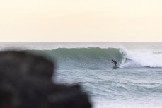 Matt Jenks rides a wave at Second Beach near St Clair, Dunedin, New Zealand.
Photo: Derek Morrison