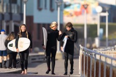 Rewa and Keo Morrison walk along the esplanade with Josh Fairbairn at St Clair, Dunedin, New Zealand.
Photo: Derek Morrison