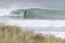 Keo Morrison makes the most of a wave during a swell generated by Cyclone Lola as it reaches Aramoana, Dunedin, New Zealand.Photo: Derek Morrison