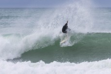 Brad Melville enjoys a swell generated by Cyclone Lola as it reaches Aramoana, Dunedin, New Zealand.Photo: Derek Morrison