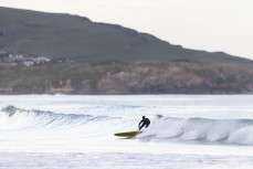 A longboarder knifes into a runner at St Clair, Dunedin, New Zealand.
Photo: Derek Morrison