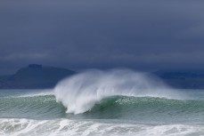 A wave breaks during a swell generated by Cyclone Lola as it reaches Aramoana, Dunedin, New Zealand.
Photo: Derek Morrison