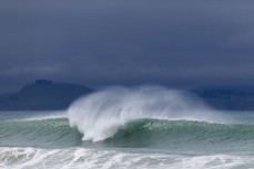 A wave breaks during a swell generated by Cyclone Lola as it reaches Aramoana, Dunedin, New Zealand.Photo: Derek Morrison