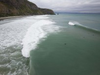 Lineup during a swell produced by Cyclone Lola on the north coast of Dunedin, New Zealand.