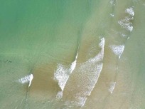 Waves on a bar near Ngunguru on the Tutukaka Coast, Northland, New Zealand.