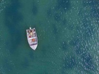 A fisherman parks up in the current at Ngunguru on the Tutukaka Coast, Northland, New Zealand.