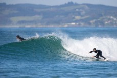 Thomas Oki drives off the bottom during a fun swell at Blackhead, Dunedin, New Zealand.