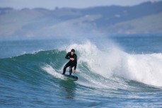 Mike Farrell makes the most of a fun swell at Blackhead, Dunedin, New Zealand.