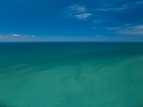 Intensely coloured water at Te Awanga, Hastings, Hawke's Bay, New Zealand.