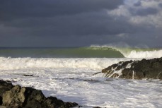 Lineup during a swell produced by Cyclone Gabrielle on the north coast of Dunedin, New Zealand.
