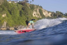 Rewa Morrison rides a wave at Uluwatu, Bali, Indonesia.