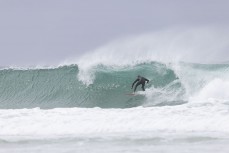 Dunedin's Jack McLeod weaves into a barrel during a free surf at the 2024 New Zealand Surfing Championships held at Blackhead, Dunedin, New Zealand.