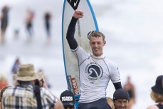 Daniel Farr celebrates becoming the 2024 National Champion at the 2024 New Zealand Surfing Championships held at St Clair, Dunedin, New Zealand.