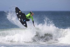 Spencer Rowson takes flight during the 2024 New Zealand Surfing Championships held at St Clair, Dunedin, New Zealand.