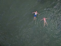 Rachael and Rewa bathing in 28°C plus water at Marahau, Tasman, New Zealand.