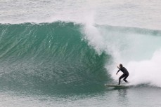 A surfer makes the most of a clean summer swell at St Clair, Dunedin, New Zealand.
Photo: Derek Morrison