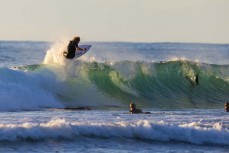 Keo Morrison enjoys a surf at Piha, Auckland, New Zealand.