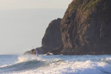Tao Mouldey lets fly at Piha, Auckland, New Zealand.