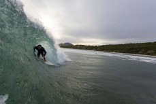 Connor Tomoana gets tubed at Blackhead, Dunedin, New Zealand.