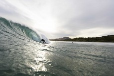 Jeff Patton rides a wave at Blackhead, Dunedin, New Zealand.