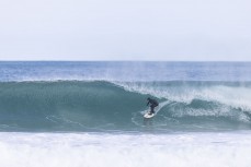 Young Max Wooffindin on a hollow one at Blackhead, Dunedin, New Zealand.
