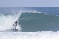 Davy Wooffindin on a hollow one at Blackhead, Dunedin, New Zealand.