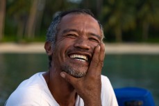 Boat driver Uncu with a toothache at Telos, Sumatra, Indonesia.