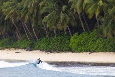 Brett Wood on a small day in the Telo Islands, Sumatra, Indonesia.