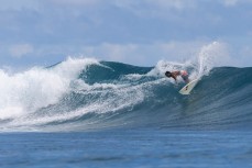 Sugud carves a face in the Telo Islands, Sumatra, Indonesia.