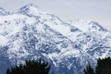  Snow in the mountains near a surf break near Kaikoura, New Zealand. Photo: Derek Morrison