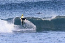 Alexis Owen makes the most of a small winter swell at Blackhead, Dunedin, New Zealand.Photo: Derek Morrison