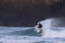 Flint Sherborne-France slides the tail during a small winter swell at Blackhead, Dunedin, New Zealand.Photo: Derek Morrison
