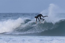 Lewis Murphy on a small winter swell at Blackhead, Dunedin, New Zealand.Photo: Derek Morrison