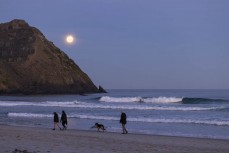 Full moon and clean peaks during a small winter swell at Blackhead, Dunedin, New Zealand.Photo: Derek Morrison