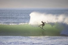 Flint Sherborne-France tail slide up the North Coast, Dunedin, New Zealand.Photo: Derek Morrison