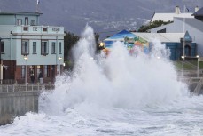 A large winter storm swell rolls into the seawall and The Hydro building on the Esplanade at St Clair, Dunedin, New Zealand.
Photo: Derek Morrison