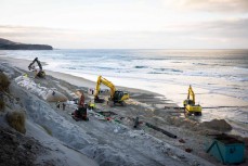 DCC fill sandbags to combat beach erosion at St Kilda, Dunedin, New Zealand.Photo: Derek Morrison