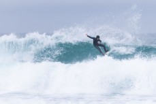 Jack Higgins during a fun swell at Blackhead, Dunedin, New Zealand.Photo: Derek Morrison