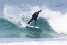 Dane Robertson during a fun swell at Blackhead, Dunedin, New Zealand.Photo: Derek Morrison