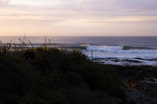 Sunrise reveals a fun winter swell at a beachbreak near Dunedin, New Zealand.Photo: Derek Morrison