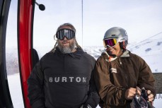 Homa and Tash Mattingly ride the gondola at Cardrona ski field, Cardrona Valley, Wanaka, New Zealand.