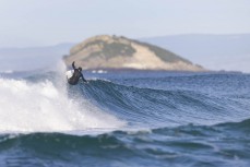 A surfer turns off the top during a fun east swell at Blackhead, Dunedin, New Zealand.Photo: Derek Morrison