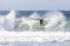 Sam Charlesworth carves a section during a fun east swell at Blackhead, Dunedin, New Zealand.Photo: Derek Morrison
