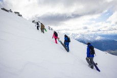 Team Cool Runnings climb the peak at Treble Cone ski field, Wanaka, New Zealand.