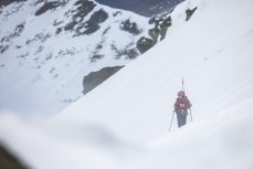 Eva Small climbs to the start gate at the opening round of the New Zealand Junior Freeride Tour held at Treble Cone ski field, Wanaka, New Zealand.