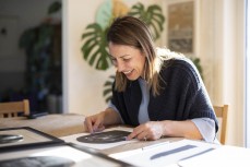Artist Virginia Watson at her home with her developing shipwreck series of prints, St Kilda, Dunedin, New Zealand.Photo: Derek Morrison