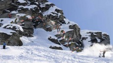 A skier goes huge during a powder day at Treble Cone ski field, Wanaka, New Zealand.